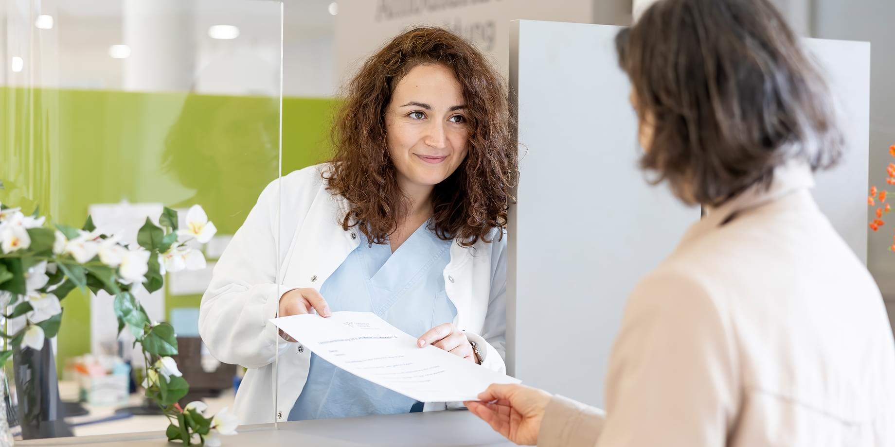 Eine Patientin im Aufnahmegespräch
